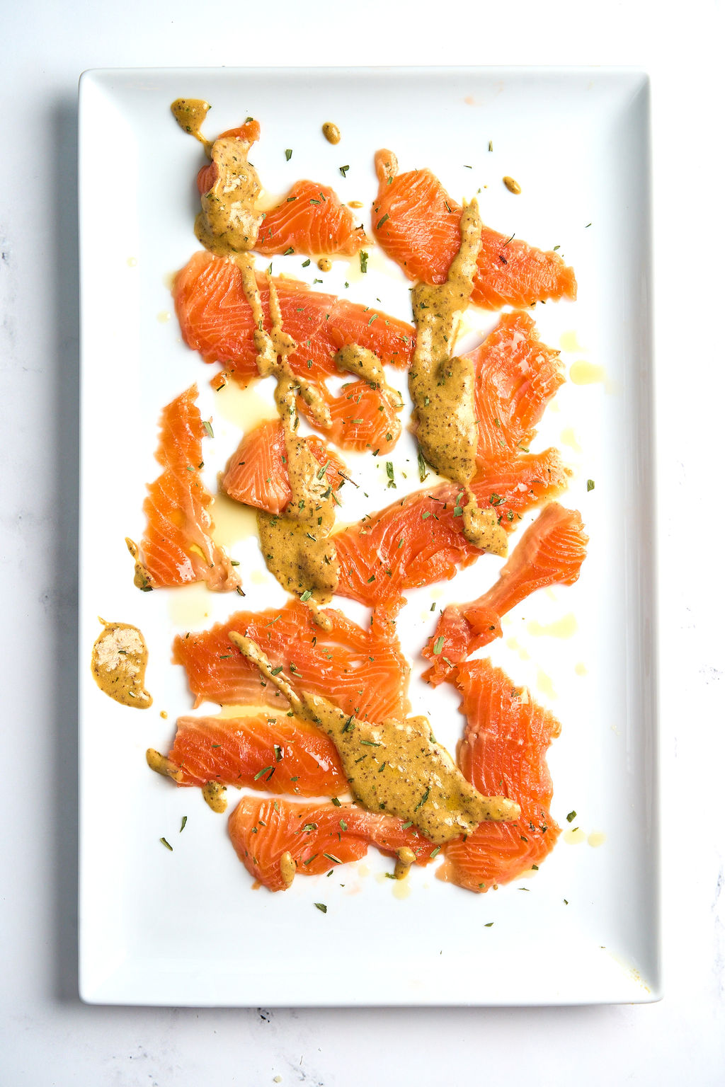 TROUT GIN AND HERB GRAVLAX WITH A MUSTARD SAUCE